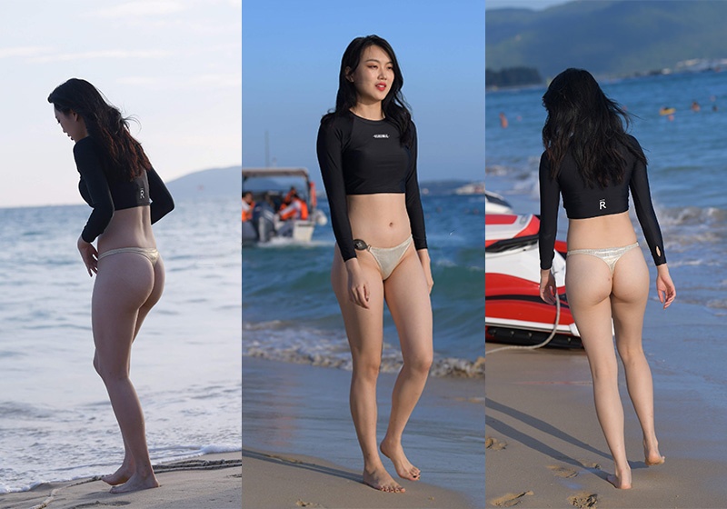 M964.海边的金色比基尼美女图片